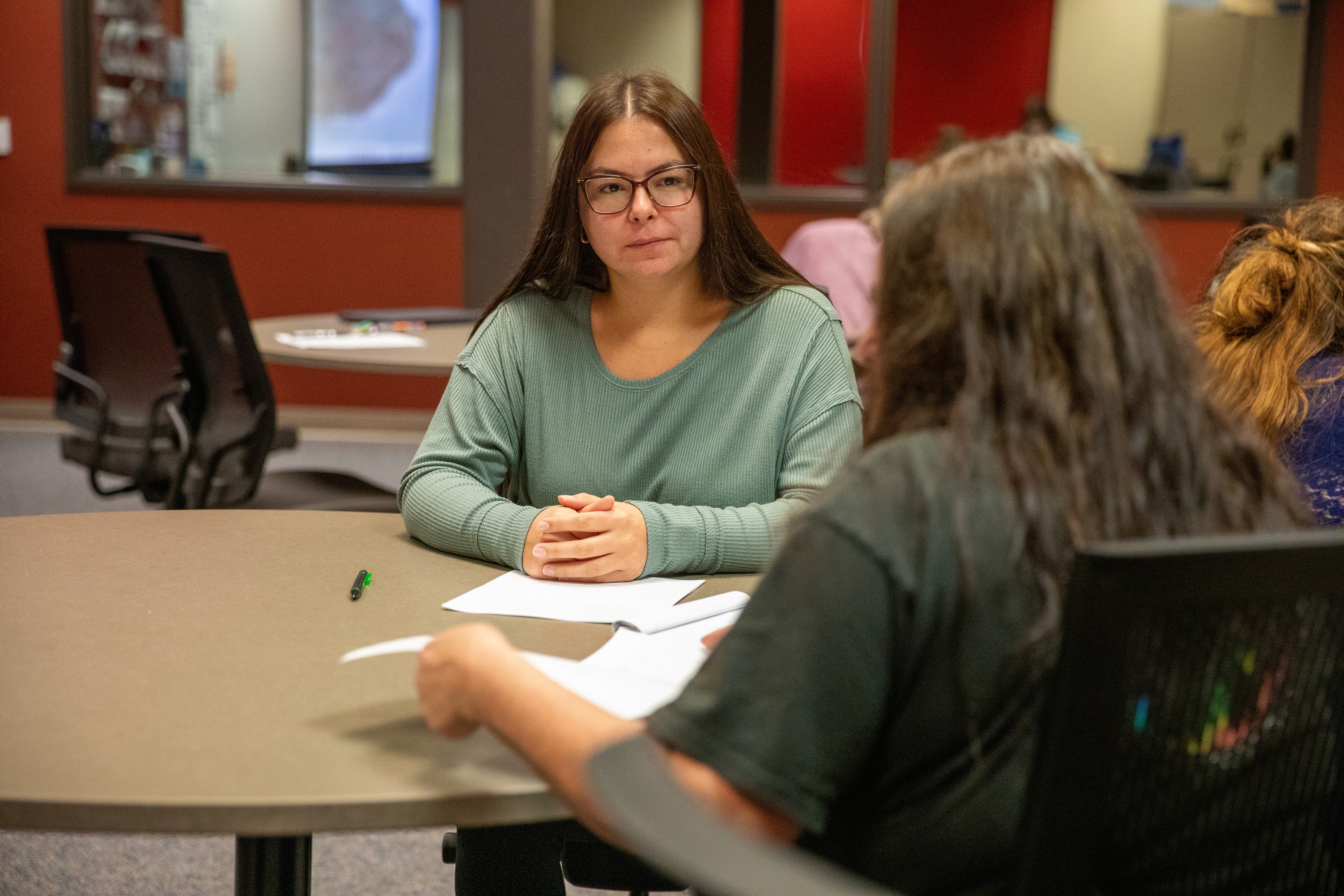 One woman interviewing another woman